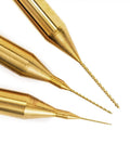 Three micro drill bits from 10 Pcs Micro Drill Bit Set 0.2mm to 1.1mm With 1 Eighth Inch Shank Spiral Flute CNC Router Bits