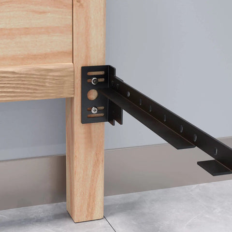 Close-up of Tough As Nails Bed Frame Footboard Extension Brackets set on a wooden frame, designed for easy assembly.