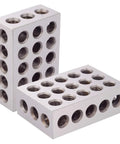 Pair of hardened steel machinist milling blocks, 1x2x3 in, with 23 threaded holes each.