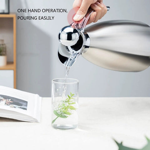 68 Oz Stainless Steel Coffee Thermal Carafe With Double Wall Vacuum Insulation Keeps Your Joe Hot 12 Hours Or Cold 24 Hours pouring into glass