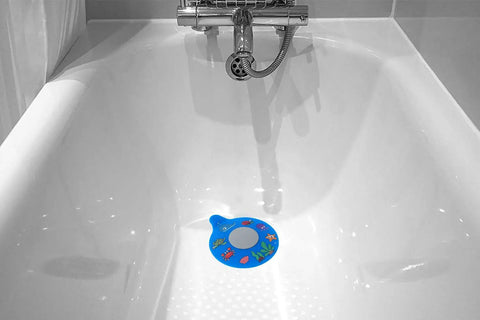 Slick Silicone Bathtub Drain Stopper, Hella Leak Proof Tub Cover, BPA Free Sink Plug in blue with marine designs placed in a bathtub.