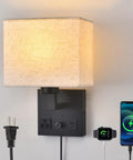 Plug In Wall Sconce Hits Different With Touch Dimmer, Matte Black Metal Base Wrapping Soft Cream Fabric Drum Shade, Straight Out The Box AC Outlet And USB Port. Compact wall lamp with USB ports.