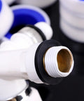 Close-up of PTFE tape on threaded plumbing fitting, showcasing Six Pack PTFE Plumbing Tape Sealant For Quick Leak Stops At Pipe Fittings And Sink Drains Waterproof Thread Sealant Tape For Do It Yourself Repairs Pro Grade Leak Prevention For Home And Industrial Use.