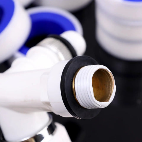 Close-up of PTFE tape on threaded plumbing fitting, showcasing Six Pack PTFE Plumbing Tape Sealant For Quick Leak Stops At Pipe Fittings And Sink Drains Waterproof Thread Sealant Tape For Do It Yourself Repairs Pro Grade Leak Prevention For Home And Industrial Use.