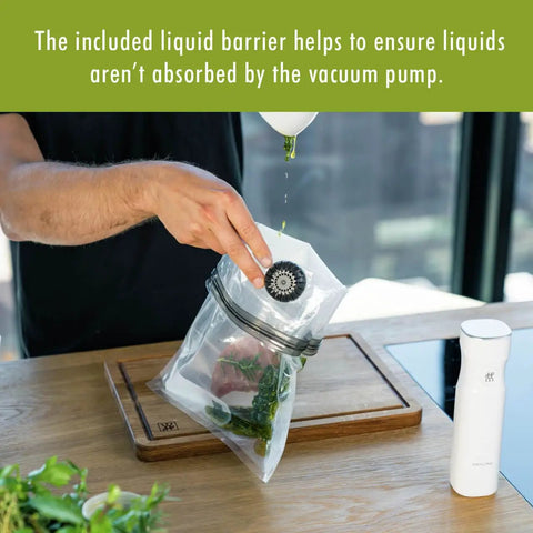 Fresh And Save 10 Piece Vacuum Sealer Bags Set For Sous Vide Meal Prep And Freezer Storage Assorted Sizes Keeps Food Fresh Up To Five Times Longer And Cuts Waste shown hands sealing bag with food and vacuum pump on table