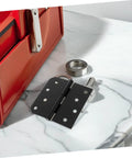 Premium Black Matte Indoor Door Hinges For Interior Wood Doors Stainless Steel inside Hardware, set of three on marble surface.