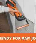 Person using Cordless Oscillating Multitool With 12V Battery, QuickIN Accessory Change In Under 3 Seconds for cutting copper pipe