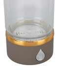 Keep It Fresh And Locked In With This Portable Hydrogen Water Bottle Featuring USB Rechargeable Tech And Stainless Steel Build For Antioxidant Rich Hydration At The Gym Or Office All Day Long. Close-up of the base and button.