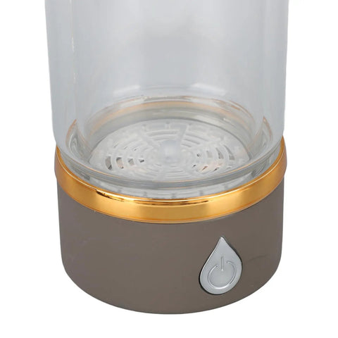 Keep It Fresh And Locked In With This Portable Hydrogen Water Bottle Featuring USB Rechargeable Tech And Stainless Steel Build For Antioxidant Rich Hydration At The Gym Or Office All Day Long. Close-up of the base and button.