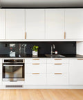 Modern kitchen with Five Pack Adhesive Edge Pulls For Cabinets No Drill Hidden Drawer Handles Flat Stick On Brushed Gold Finish