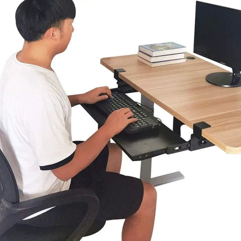 Slick Glide Under Desk Keyboard Tray With Smooth Pull Out Drawer Holds Mouse And Keyboard Ergonomic Sliding Extender For Killer Posture and No Sweat Workspace Setup in use.