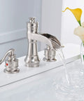 Brushed nickel widespread bathroom faucet with waterfall flow, 8 inch centers, 2 handles, and pop-up drain assembly.