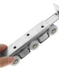 Smooth Glide Sliding Barn Door Track Kit Manganese Steel Wheels Heavy Duty Hardware Set with white wheels and metal track.