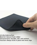 Hand lifting edge of black Mechanic Mouse Pad For Gearheads And Handymen Non Slip Auto Shop Desk Mat Great Gift For Men Dads 9.5 Inch