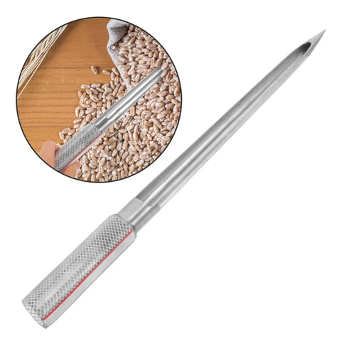 Stainless Steel Grain Sampler Probe Tool With Rubber Grip For Outdoor Gardening And Farm Use, shown sampling wheat seeds.