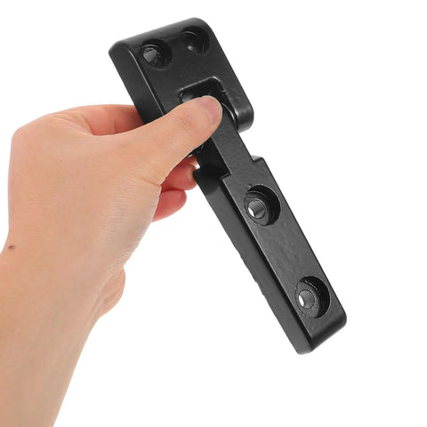 Hand holding heavy duty dual joint forklift hood hinge kit for industrial engines, bolt on installation, black metal.