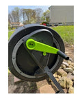 Two Stage 65 Gallon Compost Tumbler With Easy Turn Gear Kit And Cart For Effortless Turning And Rich Garden Compost, Perfect Starter Kit For Busy Home Gardeners, with a focus on the green gear handle visible.