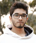 Man wearing glasses outdoors