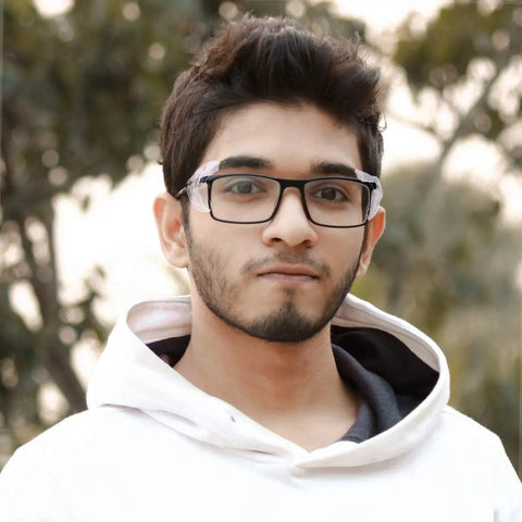 Man wearing glasses outdoors