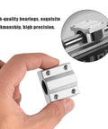 SCS8UU 8mm Linear Ball Bearing Slide Bushing For 3D Printer Parts Smooth As Butter Low Friction Motion Guide High Precision sliding block held in hand.