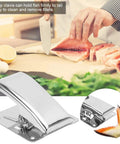 Front view of stainless steel fish fillet clamp with built-in spring for filleting.