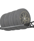 Rock Solid Heavy Duty Steel Wall Mount Tire Rack holding four tires securely, adjustable black shelving for garage use.