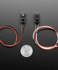Front view of Infrared Break Beam Sensor Module With Premium Wire Header Ends, 3mm LEDs, with 10-inch detection range, coin for scale.