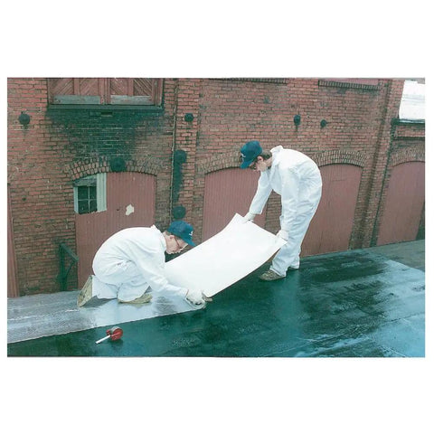 Workers applying Peel and Seal Self Stick Roll Roofing Aluminum 36 Inch Wide Durable Self Adhesive Roofing Material on rooftop