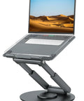 Side view of gray Telescopic Laptop Stand For Desk With 360 Degree Swivel Base Sit To Stand Height Adjustable Portable Riser holding laptop