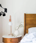 Vintage Matte Black Wall Hooks Set Of Five For Hanging Heavy Coats Umbrellas And Handbags Boasts Dope Industrial Vibes And Rock Solid Screw Mount Hardware with keys on it by a bedside table.