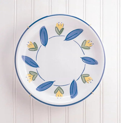 Decorative Plate Hangers For Five And A Half Inch To Eight Inch Display With Tip Protectors Built For Drywall Or Plaster Walls Easy Install Secure Bracket Clips That Keep Your Plates Safe And On Display holding a floral plate