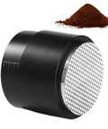 Pro Stainless Steel 58mm Coffee Distributor And Tamper With Slow Rebound Spring, showing textured plate with coffee grounds.