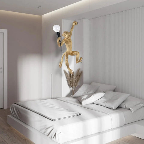 Modern Resin Monkey Wall Lamp with Hemp Rope Accent in a bedroom, adding playful charm and subtle illumination to white decor.