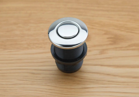 Chrome Touch Activated Garbage Disposal Air Switch Kit on wood surface, fits one and three eighths inch sink hole or countertop island