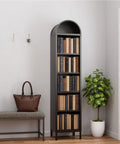 73 Inch Tall Arched Metal Bookshelf With 5 Shelves Heavy Duty Steel Construction near bench and plant in room corner.
