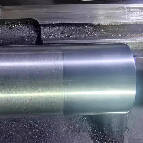 RHKING mini lathe burnishing tool with polished metal cylinder on lathe bed.