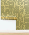 Dope Abstract Graffiti Gold Metallic Wallpaper Fibrous Texture Eco Friendly Type I Class A Fire Rated Made In USA Non Toxic Paste The Wall Premium Indoor Wall Covering Badass Home Accent displayed on a wall.