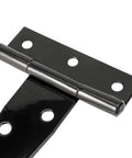 Close-up of a black T-strap hinge, part of a 20 Pack 4 Inch Black T Strap Hinges Bulk Heavy Duty Iron Barn Door Hinges With Screws.