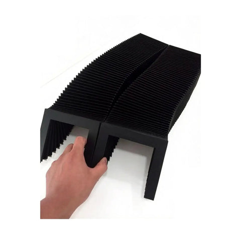 Hand holding Pro Grade Corrugated Protection Bellows Cover for guide rails and ball screws, 100x15mm internal, 450mm extended length