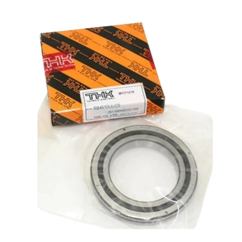 Top Shelf Cross Roller Bearings RB6013 And RB6013UUC0 Precision Slewing Ring for robots in packaging with labels.