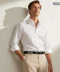 Man wearing Premium Leather Ratchet Dress Belt For Men With Automatic Buckle, Easy Tug And Click Adjustable Fit Up To 50 Inches and white shirt.