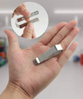 16 Pack Universal Car Visor Clips For Garage Door Remotes, silver snap-on mounts shown in hand for scale and installation view
