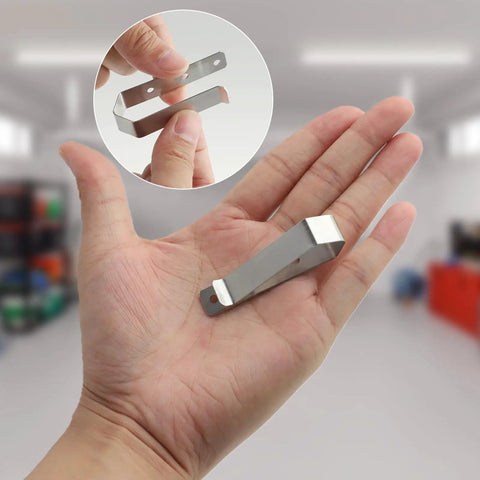 16 Pack Universal Car Visor Clips For Garage Door Remotes, silver snap-on mounts shown in hand for scale and installation view