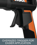 Close-up of the oversized trigger on the Cordless Full Size Hot Glue Gun With 20V Power Share Battery And Charger for ease of use.