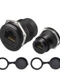 Hella Sleek Cat6 Rj45 Panel Mount Connector With Threaded Bulkhead Coupler displayed with protective dust covers.