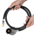 Hands holding Rugged 4 Foot Vertical Propane Hose With Low Pressure Regulator For LP Gas Grills Heaters And Fire Pits QCC1 Type 1