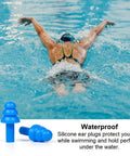 Person swimming with soft reusable silicone ear plugs for swimming sleeping and concerts with individually wrapped waterproof ear protection in focus.