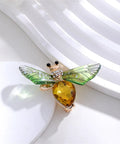 Vintage Crystal Bee Brooch For Women Featuring Amber And Clear Rhinestone Bumblebee Wings on white background.