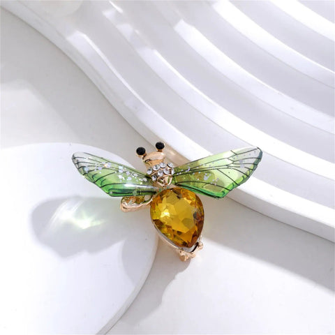Vintage Crystal Bee Brooch For Women Featuring Amber And Clear Rhinestone Bumblebee Wings on white background.