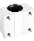 Rock Solid Aluminum Alloy Linear Motion Ball Bearing Slide Block Bushing, seamless glide design, side view with threaded holes.